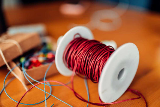 Waxed cotton cord spool for jewellery making projects